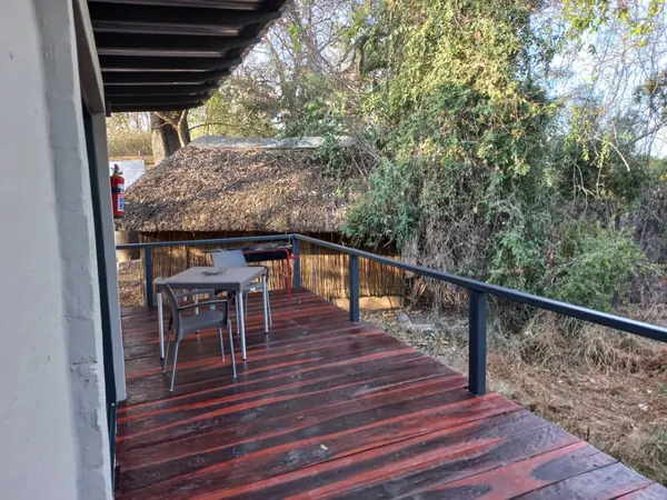 Private wooden deck looking into the riverine bush
